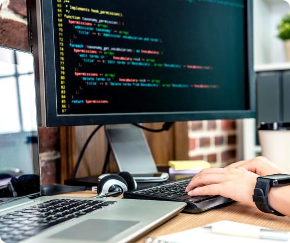 man on laptop coding